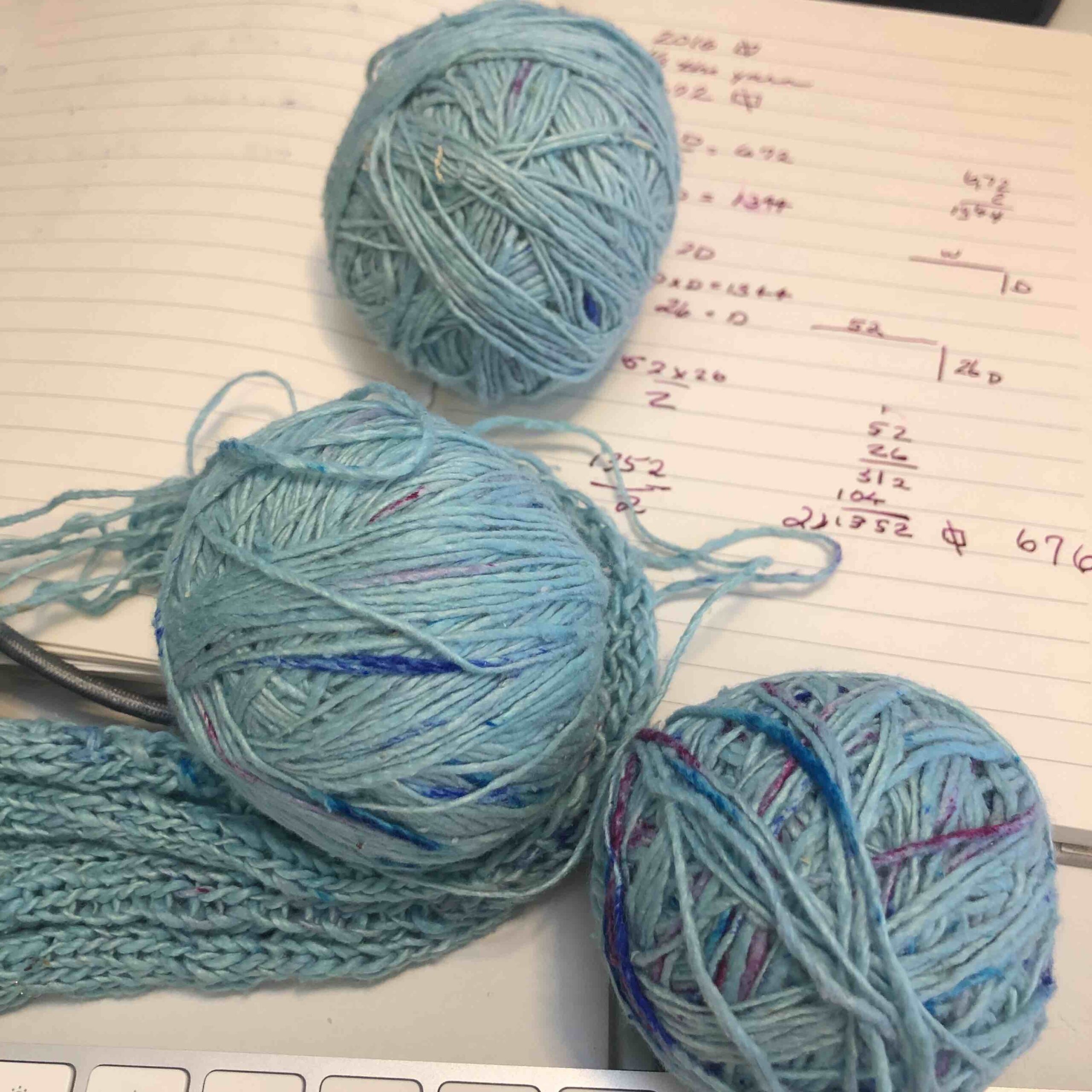 three balls of yarn for shawl math