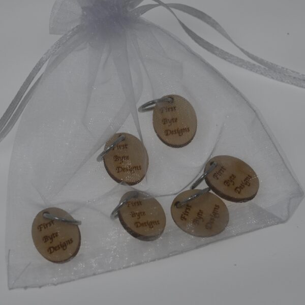 six stitch markers in a bag